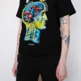 Model wearing the oversized Amsterdam mushroom print t-shirt